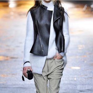 3.1 Phillip Lim Black Leather Vest over White Knit Sweater
